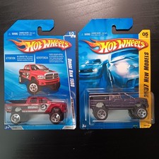 Hot Wheels 2007 New Models Dodge Ram 1500 - Pair Black/Red  Purple/White, NIP