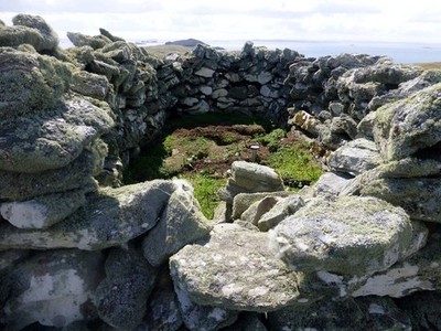 Photo A2 North Hill, Out Skerries Housay Unidentified survey marker in s c2013