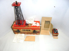 COLBER ROTARY BEACON AND ILLUMINATED BUMPER END WITH ORIGINAL BOXES POST WAR