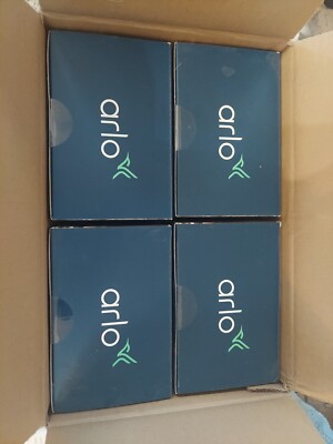 4 Pack Arlo Essential Spotlight cameras W/mounting Gear & 2 Solar Panels. Unopen