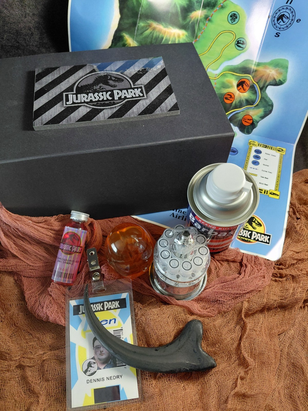 Lata de ADN Dennis Nedry Barbasol utilería de película Jurassic Park con tapa de bastón y garra