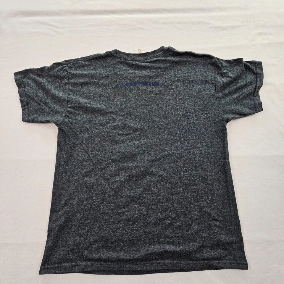 Camiseta Don't Stop Rockin' Guitar Wings azul manga curta Youth M - Imagem 3 de 4