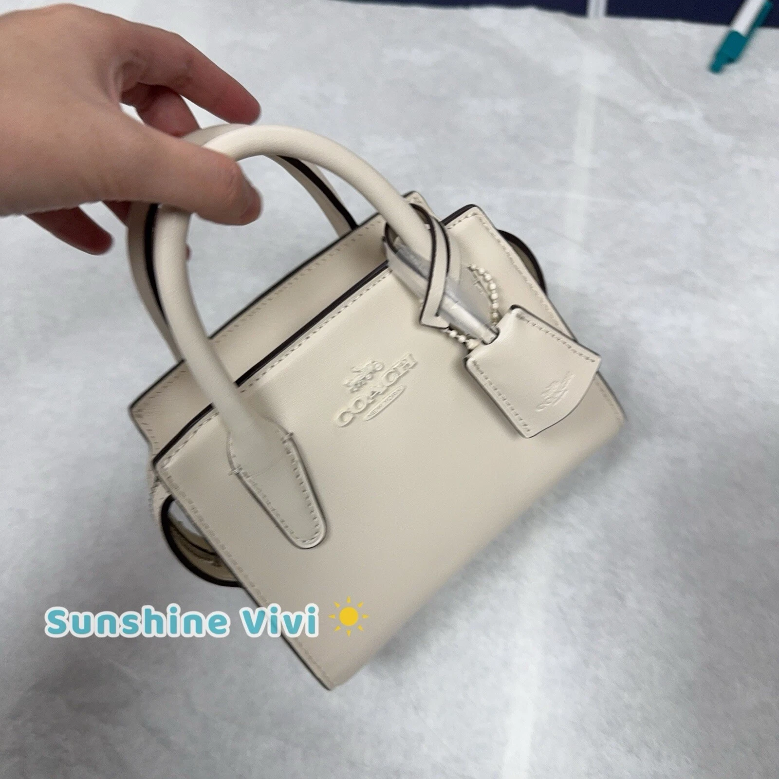 Borsa a tracolla Coach Andrea Mini nuova con etichette in raffinata pelle di vitello CO974 gesso
