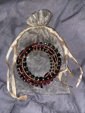 BOHO NWOT PLUM COLORED COIL BRACELET