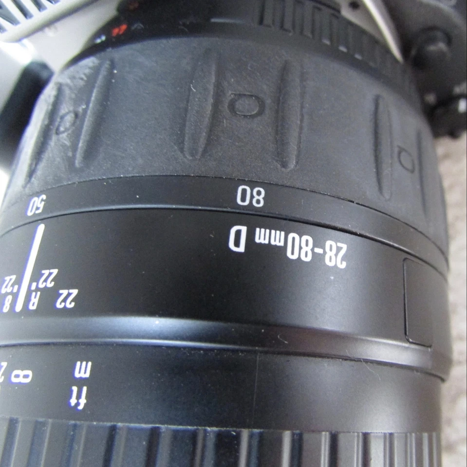 Nikon N65 35mm SLR Camera Package 2 Quantaray Lenses, Film, Bag - Image 3 of 4