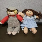 Vtg 2 Cabbage Patch Kids Dolls Boy in cap 1984 Girl in Blue dress Yarn Hair 1982