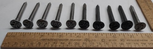 10 - NAILs - RAILROAD / TELEPHONE POLE / raised # on head - listing # 9705