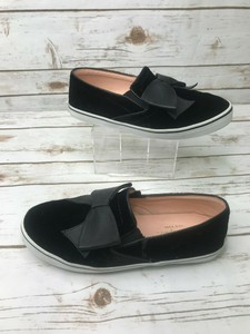 kate spade black slip on sneakers