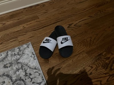 Nike Flipflops size 11 (White & Black) little dirt on the sides of the white pt.