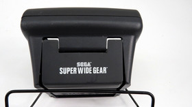 Sega Game Gear Console 2110 W/6 Games, TV Tuner, Game Genie, Power Cords, Case