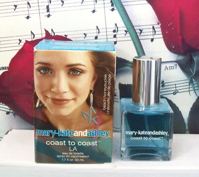 Coast To Coast La Beach Honeysuckle Eau De Toilette Spray By Mary-Kate And Ashley - 1.7 oz Coast To Coast La Beach Honeysuckle Eau De Toilette Spray By Mary-Kate And Ashley - 1.7 oz