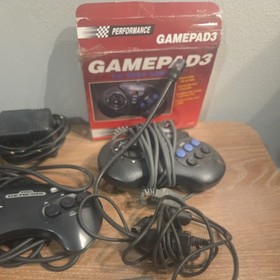 Sega genesis with 2 games and performance gamepad