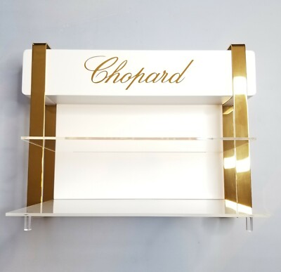 CHOPARD FOUR PIECE INSTITUTIONAL DISPLAY UNIT IN IVORY PLEXIGLASS & GOLD METAL