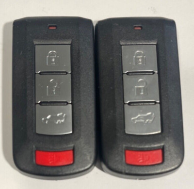 Mitsubishi Smart Keyfobs 4 Buttons Hatch Lot of 2 OEM-OUC644M-KEY-N MINT!!