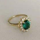 2Ct Oval Cut Lab-Created Emerald Women's Engagement Ring 14K Yellow Gold Plated
