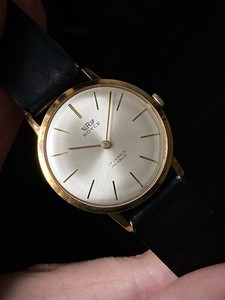 Authentic NOS 1960s Rone dress watch gold plated case silver sunburst dial AS 1690/92