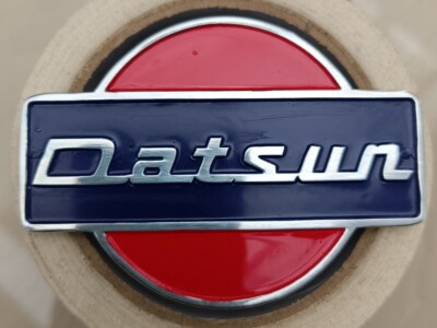 CAR BADGE - DATSUN Vintage Handwriting grill badge emblem enamel