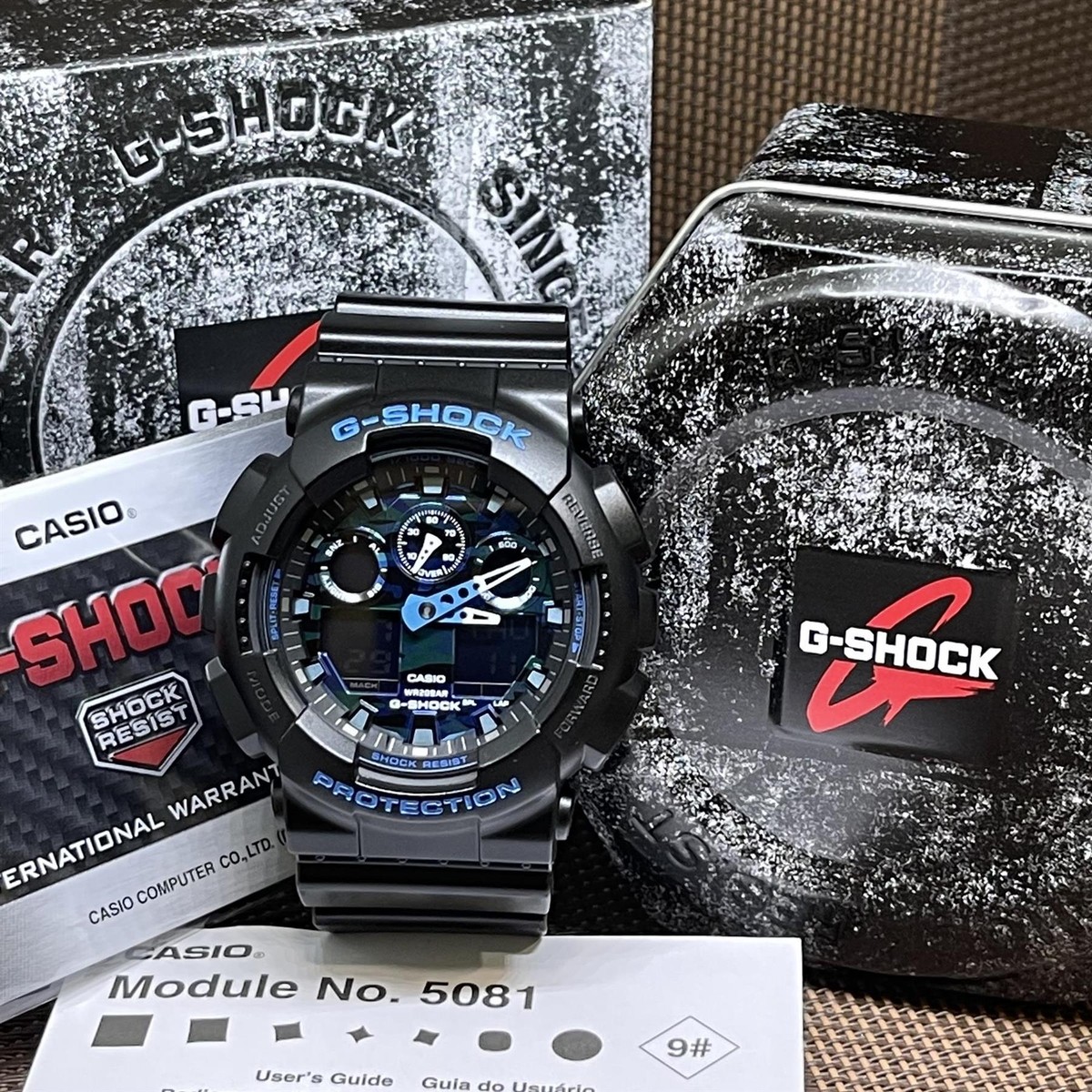 Casio G-Shock GA-100CB-1A Blue Tone Camouflage Face Analog Digital 