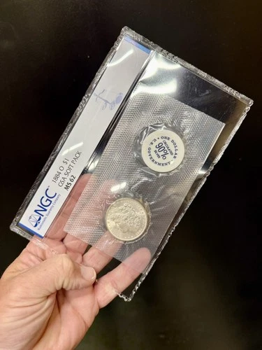 1884-O MORGAN SILVER DOLLAR  GSA SOFT PACK NGC MS62