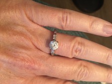 925 sterling silver round cubic zirconia with side baguettes size 6