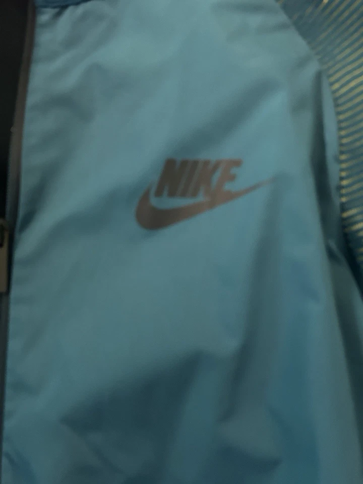 Chaqueta universitaria Nike Tech Knit Dynamic Reveal para hombre talla XL turquesa/verde Foto 3 de 4