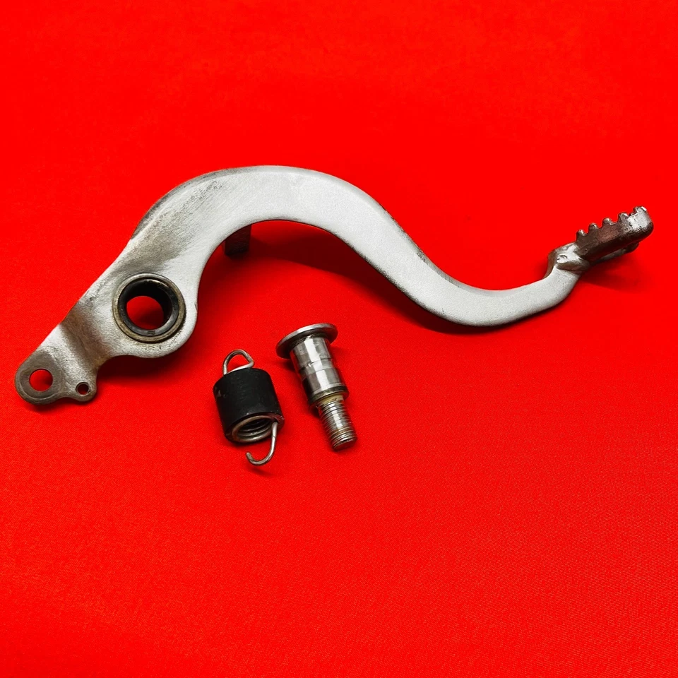 ПЕДАЛЬ РЫЧАГА ЗАДНЕГО ТОРМОЗА CRF150R + ПРУЖИНА ПОДЛИННЫЙ OEM HONDA CRF 150 R RB (07-23) - Изображение 2 из 4
