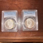 Two 1884-O Morgan Silver Dollars MS62 And MS64