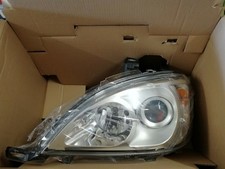 HELLA Scheinwerfer Bi Xenon für Mercedes-Benz M-Klasse W163 ab 09/2001 links