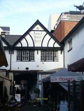 Photo 12x8 Ye Angel Hotel Yard Guildford Shops and al fresco dining where  c2011