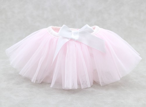 A mesh skirt bow for Bitty Baby Dolls Bitty's Ballerina Outfit