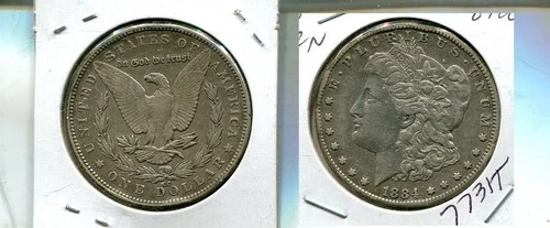 1884 CC MORGAN SILVER DOLLAR AU RIM NICKS 7731T