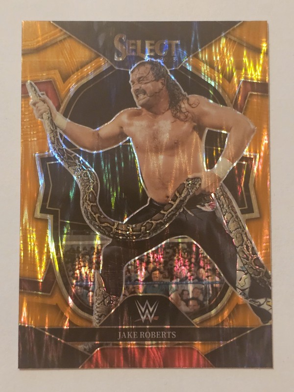 2023 Panini Select WWE - Concourse Jake "The Snake" Roberts Orange Flash Prizm