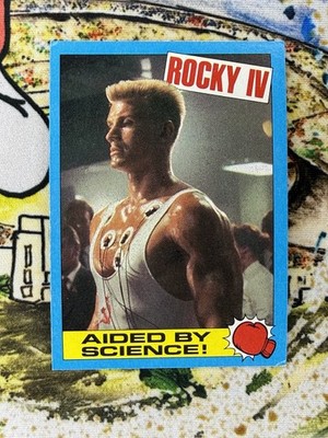 Topps Rocky IV 1985 Trading Card #34 Aided By Science Drago EX Gum Stain Back