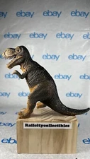 Dolgen Tyronausaurus T-Rex toy made in china 4 1/2” Tall
