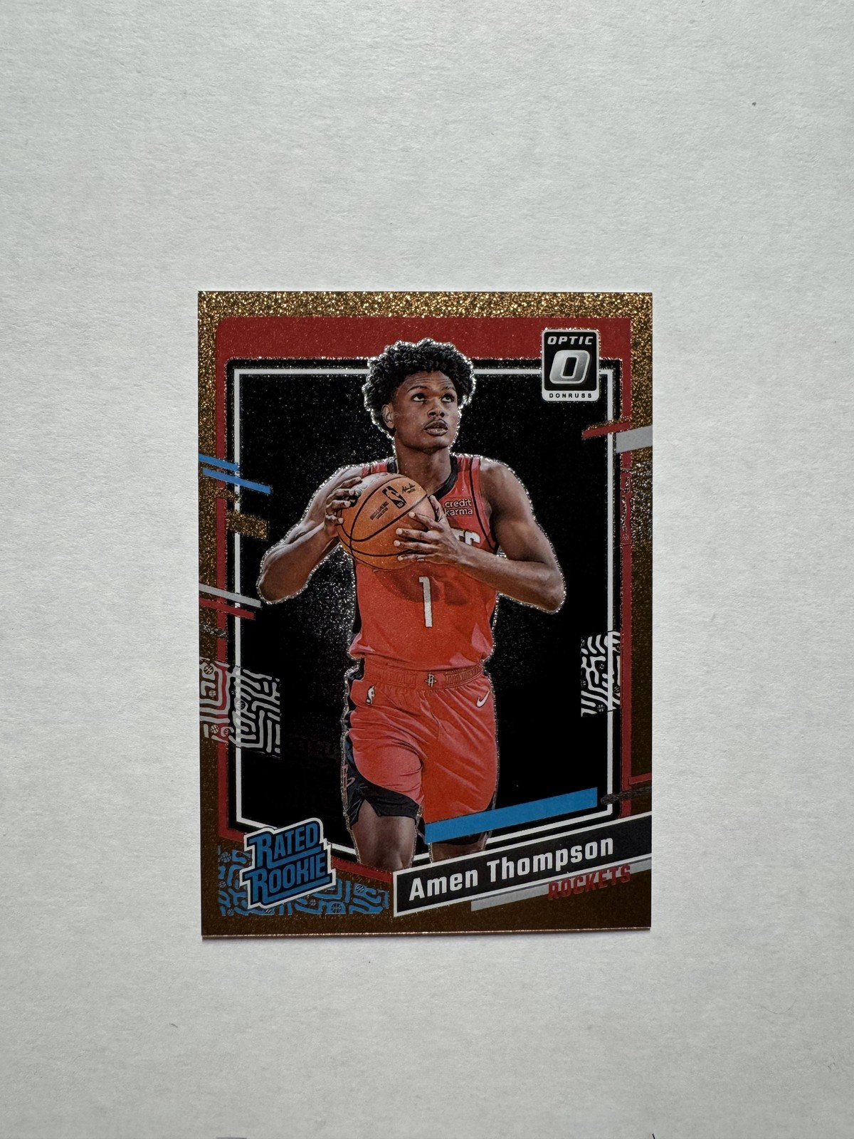2023-24 Panini Donruss Optic #229 Amen Thompson Copper Glitter Prizm RC /99