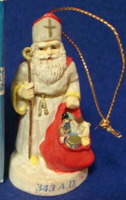 Russ Berrie Santa Through the Ages Christmas Ornament ## 5521