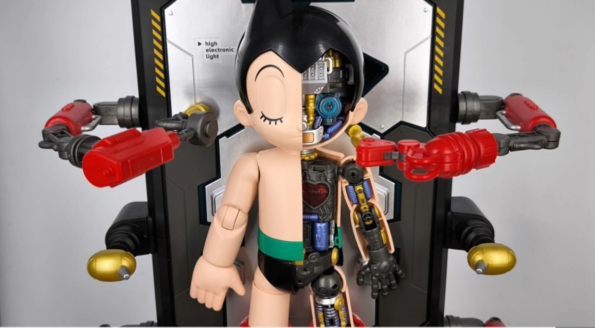 Astro Le Petit Robot - figurine articulée Bandai - Astro bras canon