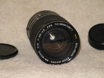 Excellent. Soligor Zoom Macro 28-80mm C/D F:3.5-4.5 Lens Canon FD mount.