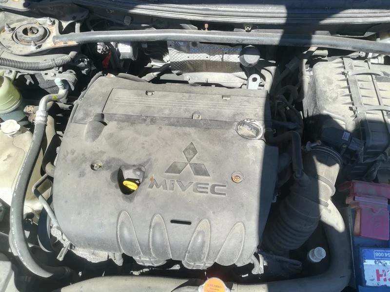 e034501 Cerraduras de cinturón cerradura de cinturón trasero izquierdo Mitsubishi Lance DE612668-07 Foto 4 de 4