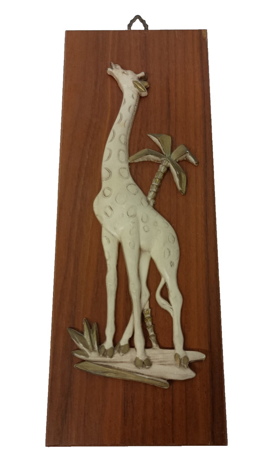 A handmade vintage 3D giraffe wall plaque in wood and plastic — the kind of quirky, sculptural one-of-a-kind piece that eBay was literally made for finding.