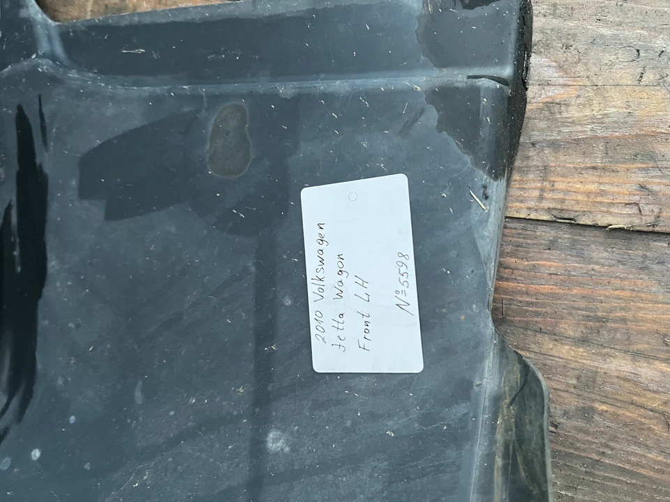 Forro guardabarros delantero izquierdo Volkswagen Jetta Sportwagen 2010-2014 OEM. Foto 2 de 4