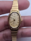 Timex Women’s Vintage Gold-Tone Oval Quartz Analog Stretch Band Working