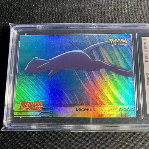 CGC 7 Topps Mewtwo Strikes Back: Legends #1 Mew RAINBOW FOIL Pokemon Card NM psa