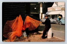 England: Mending Fishing Nets At Hastings, Susex. Unposted Postcard.