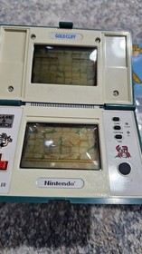 Game &Watch Gold Cliff Nintendo  Only the screen protector is visible.