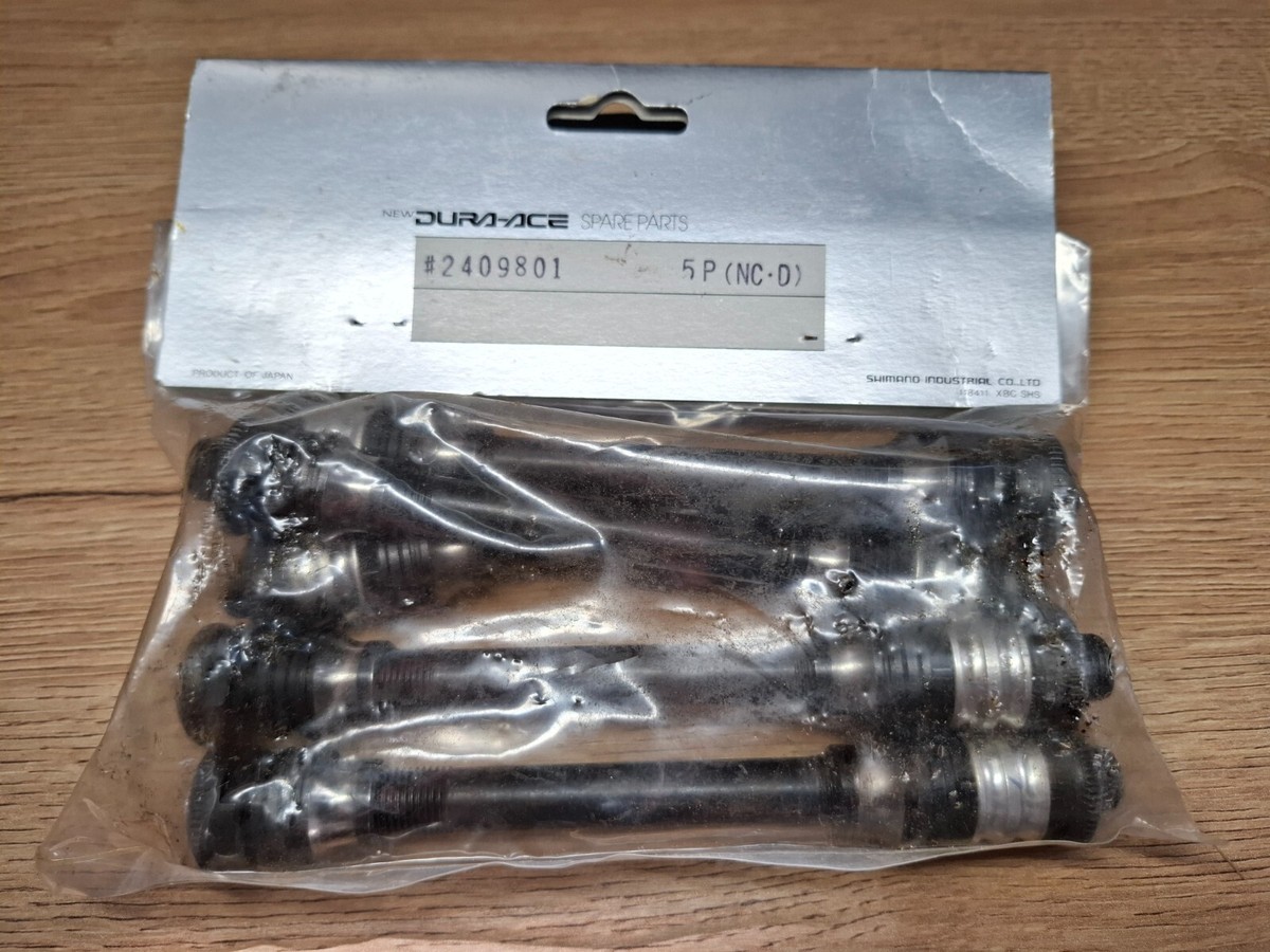 Shimano NIB NOS Dura Ace Complete Hub Axle 137mm for 7S. | eBay