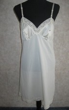 Vintage Vanity Fair ivory nylon slip with lace trim size 36