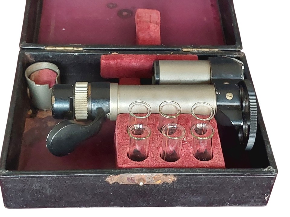 A complete, working Schmidt & Haensch hand spectrometer from Germany — the kind of precision optical instrument that turns a bookshelf into a mad-scientist's lab.