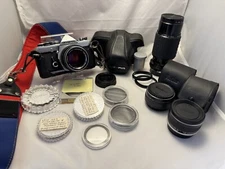 Olympus OM-1 35 mm Camera Bundle Leather Cases Strap 4 Lenses 7 Filters Adapters