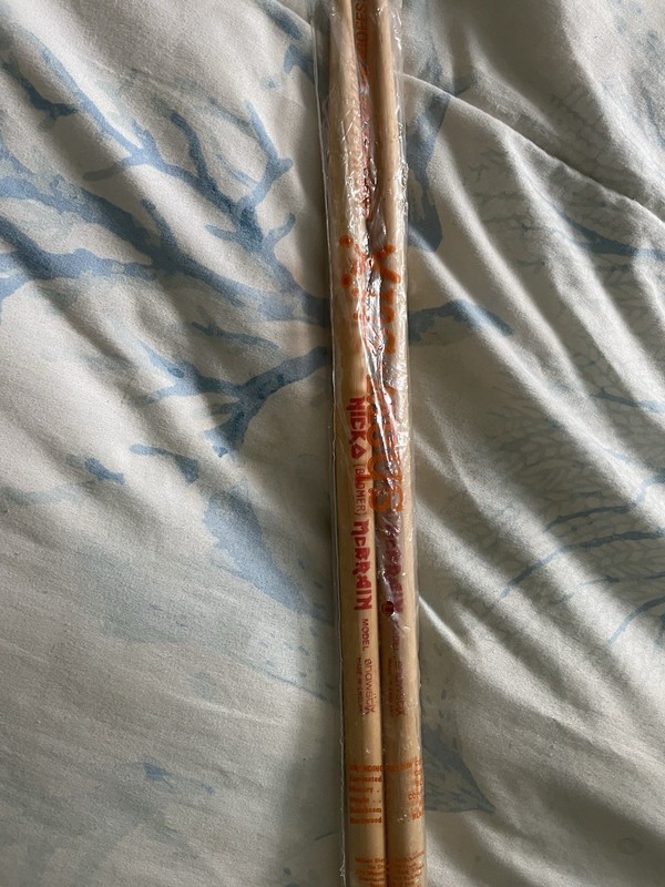 Iron Maiden - Nicko McBrain set of 2 drumsticks in package never used! 